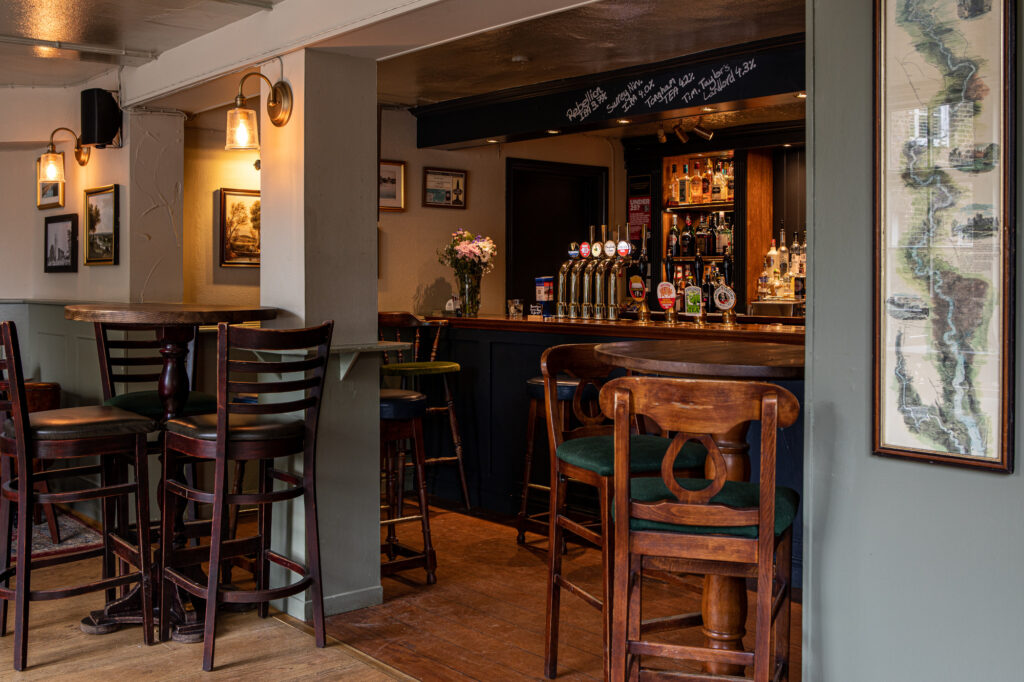 bells pub staines village seating area near bar