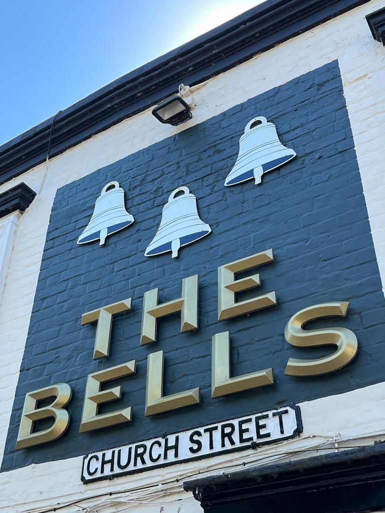 bells staines pub signage